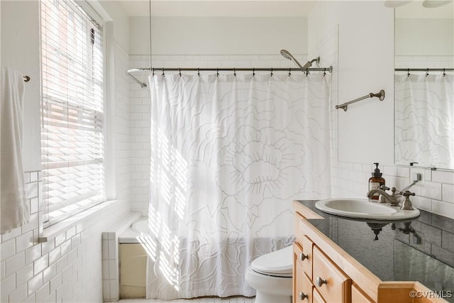 bathroom with vanity, shower / bath combination with curtain, toilet, and decorative backsplash