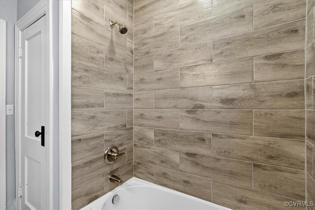 bathroom featuring bathing tub / shower combination