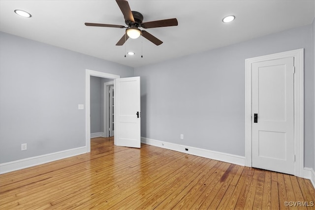 unfurnished room with light wood-type flooring, ceiling fan, baseboards, and recessed lighting