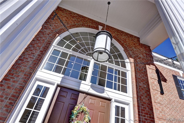 entrance to property with brick siding