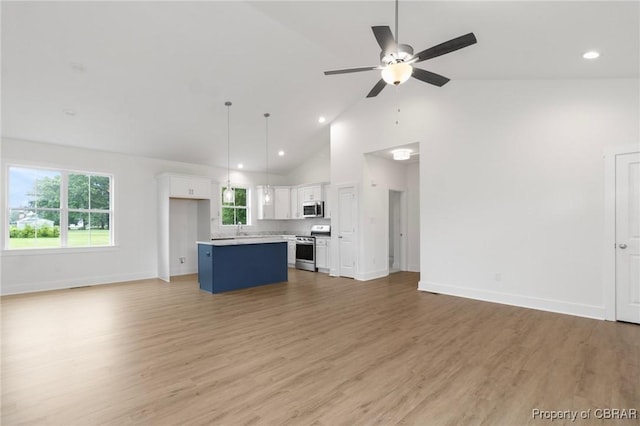 100 Bowsprit Ln, Wicomico Church, VA 22473 - unfurnished living room with a ceiling fan, high vaulted ceiling, light wood finished floors, and recessed lighting