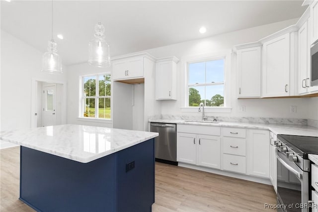 100 Bowsprit Ln, Wicomico Church, VA 22473 - kitchen featuring stainless steel appliances, light stone countertops, white cabinetry, recessed lighting, and light wood-style floors