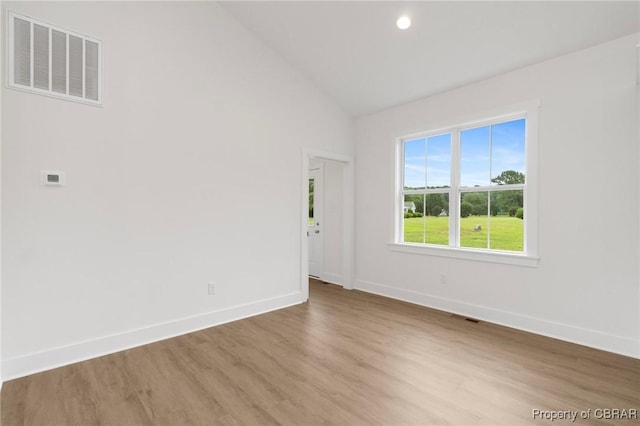 100 Bowsprit Ln, Wicomico Church, VA 22473 - unfurnished room with wood finished floors, high vaulted ceiling, and recessed lighting