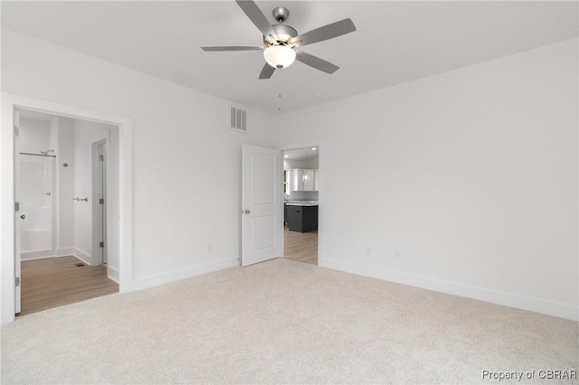 100 Bowsprit Ln, Wicomico Church, VA 22473 - unfurnished bedroom featuring carpet floors and connected bathroom