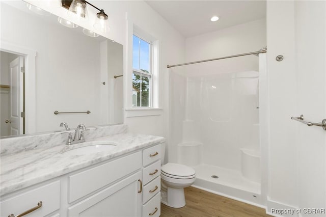 100 Bowsprit Ln, Wicomico Church, VA 22473 - bathroom with vanity, wood finished floors, and a shower