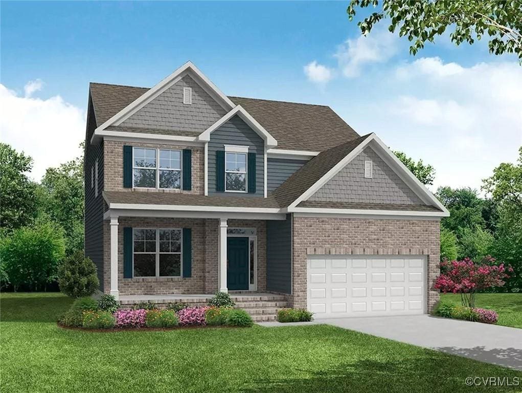 craftsman house featuring a garage, concrete driveway, brick siding, and a front yard