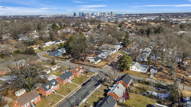 birds eye view of property with a residential view