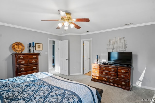 bedroom with baseboards, carpet flooring, visible vents, and crown molding