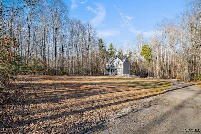 exterior space featuring a view of trees