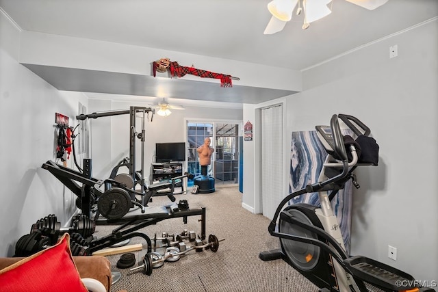 workout area with carpet flooring, ceiling fan, and baseboards