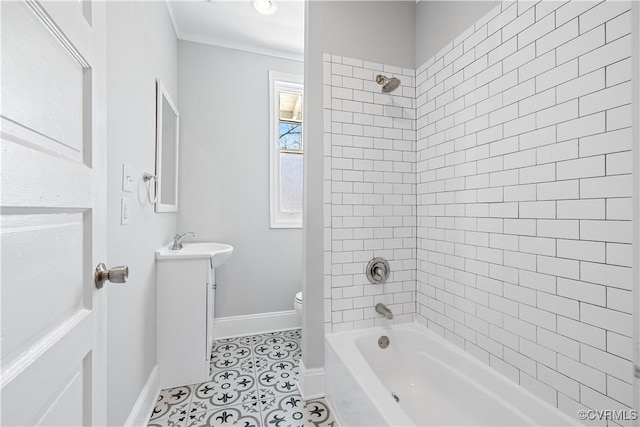 full bath featuring baseboards, toilet, shower / tub combination, tile patterned floors, and vanity