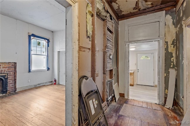 hallway with wood-type flooring