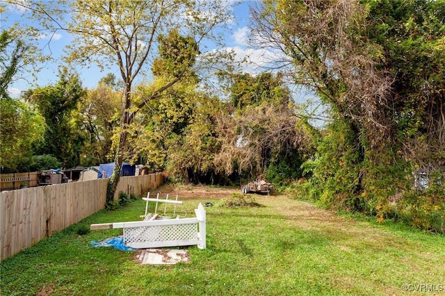 view of yard with fence