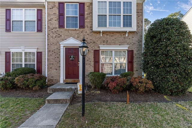 multi unit property featuring brick siding