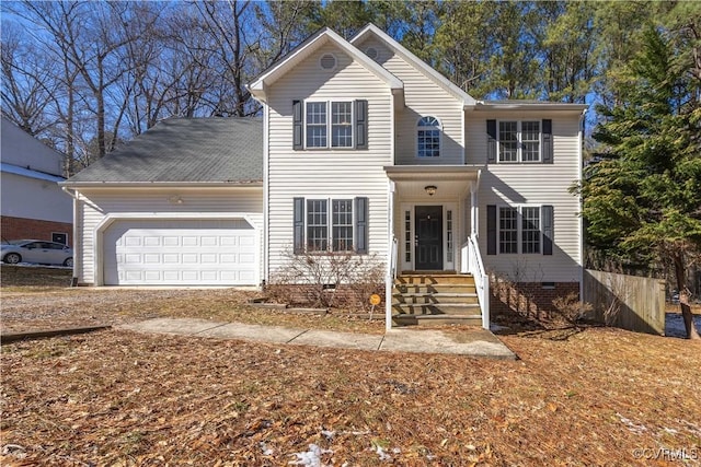 traditional home with a garage, crawl space, and fence