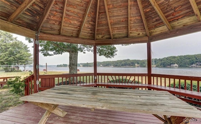 deck featuring a gazebo and a water view