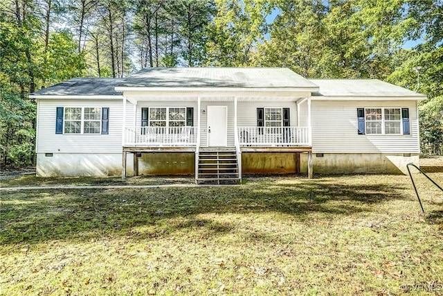 view of front of home featuring crawl space, stairway, a porch, and a front yard