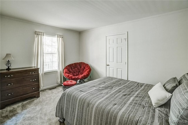 bedroom featuring light carpet and crown molding