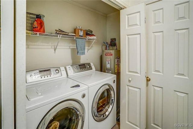 washroom with laundry area and washer and dryer