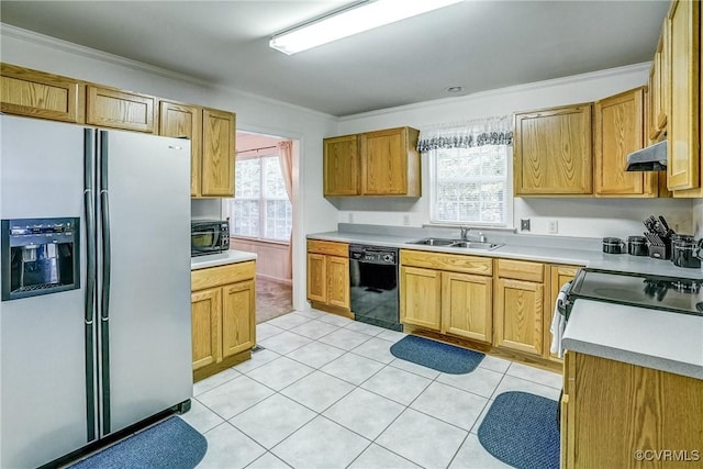 kitchen with under cabinet range hood, light countertops, black appliances, a sink, and light tile patterned flooring