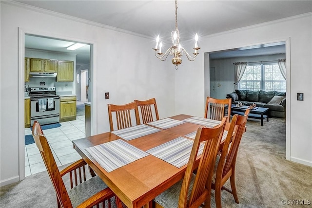 dining area with light carpet, ornamental molding, light tile patterned flooring, and an inviting chandelier