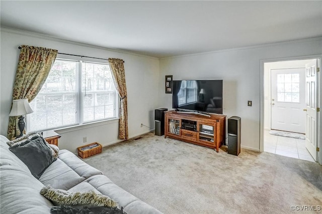 living area with light carpet, ornamental molding, and baseboards