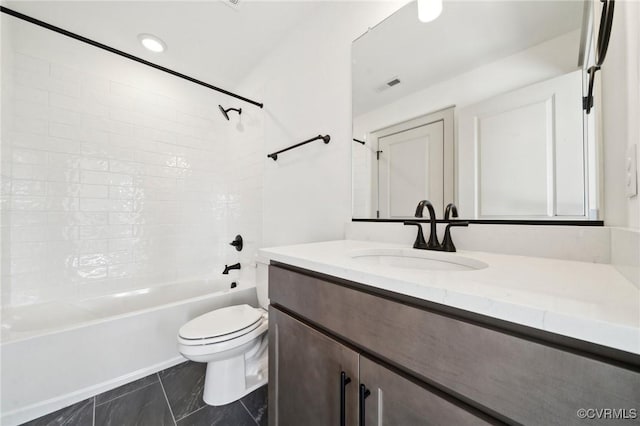 full bath with visible vents, shower / bathing tub combination, vanity, and toilet