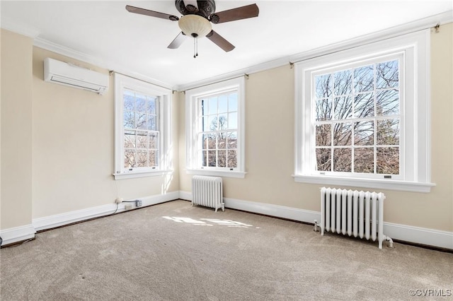 empty room with ornamental molding, radiator, carpet flooring, and an AC wall unit