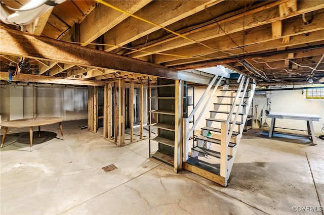 basement featuring stairway