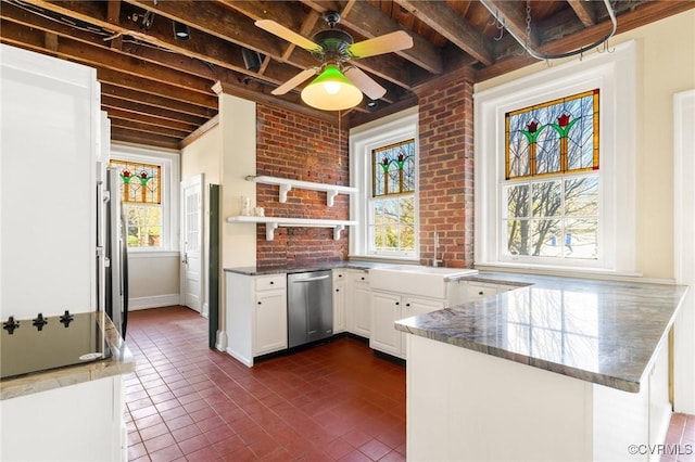 kitchen featuring open shelves, stainless steel appliances, white cabinetry, beamed ceiling, and a peninsula