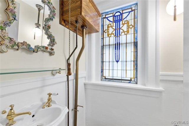 bathroom featuring wainscoting