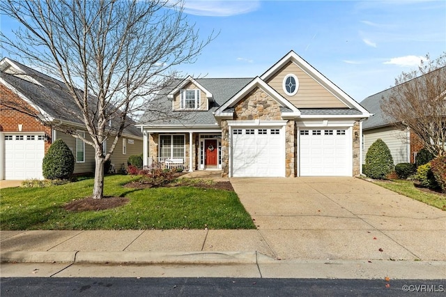 view of front facade featuring concrete driveway, stone siding, an attached garage, a porch, and a front yard