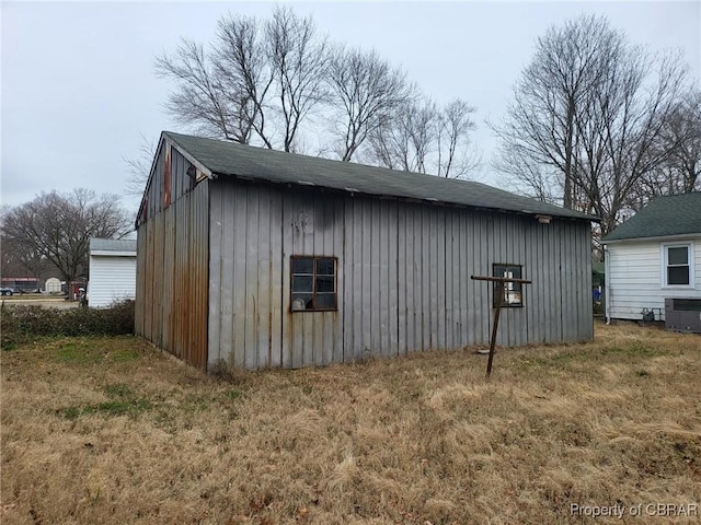 view of outbuilding with central air condition unit