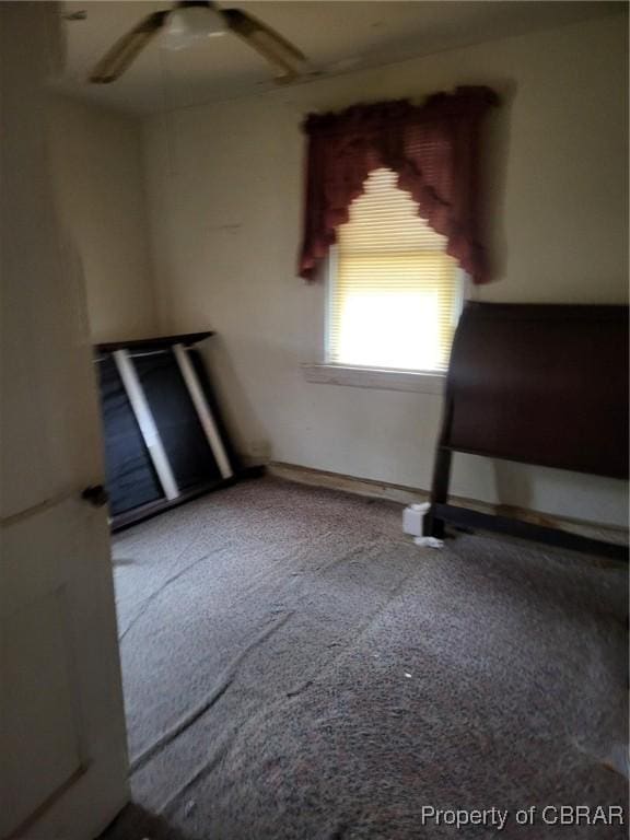 bedroom with carpet and a ceiling fan