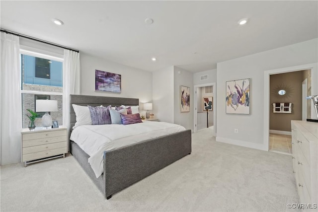 bedroom with light carpet, baseboards, visible vents, and recessed lighting