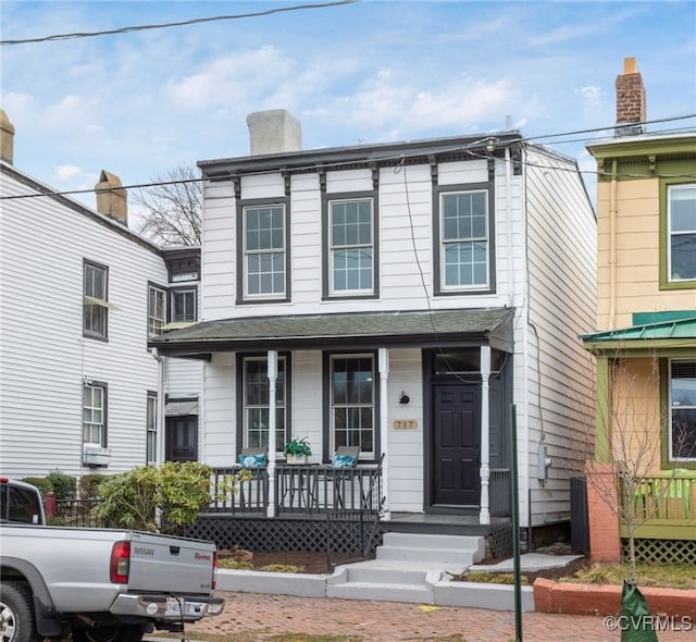 italianate house featuring a porch