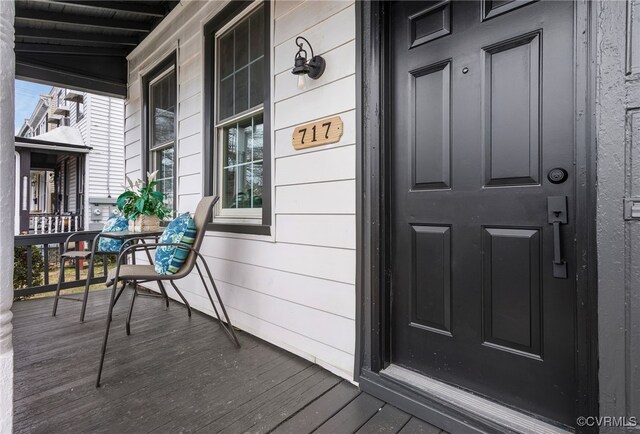 entrance to property with covered porch