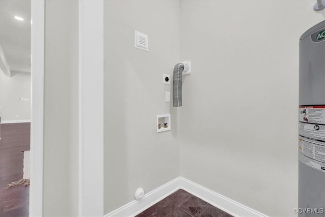 laundry room with laundry area, hookup for an electric dryer, hookup for a washing machine, and baseboards