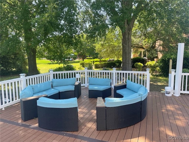 deck featuring outdoor lounge area