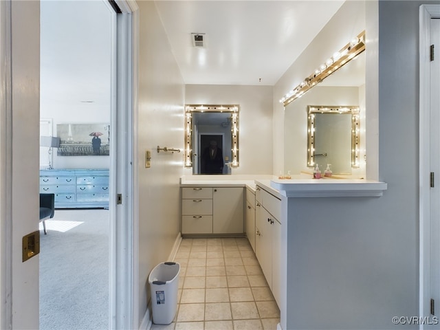 bathroom featuring visible vents and tile patterned floors