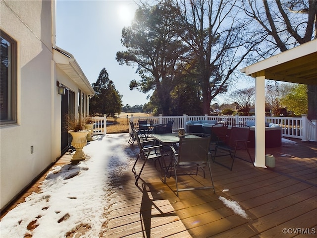 wooden deck featuring outdoor dining space