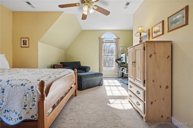 bedroom featuring light carpet, visible vents, ceiling fan, and vaulted ceiling