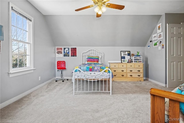 bedroom with baseboards, carpet, a ceiling fan, and vaulted ceiling