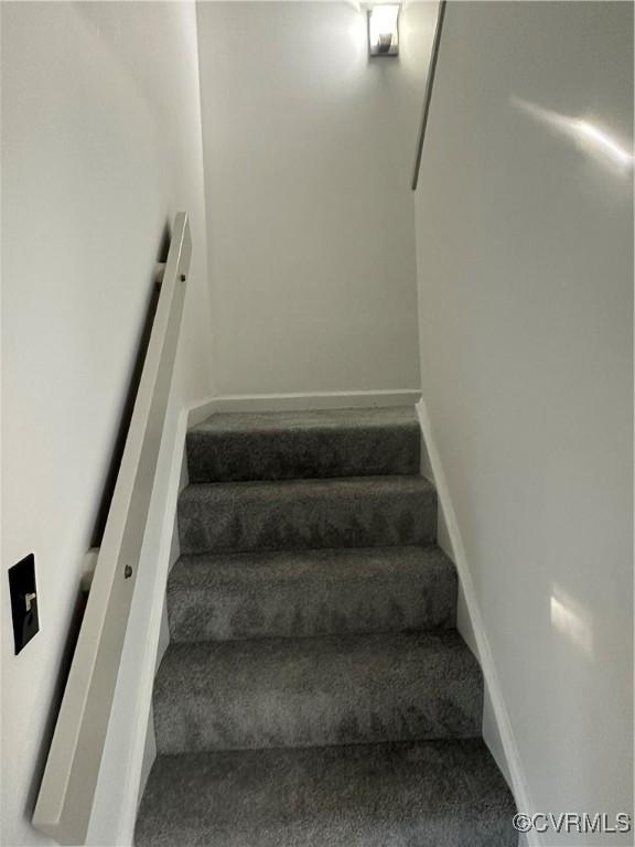 stairway with carpet floors