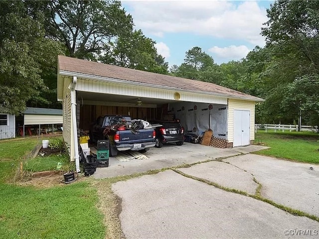 exterior space featuring aphalt driveway