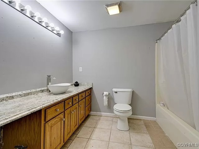 full bathroom featuring visible vents, baseboards, toilet, tile patterned floors, and vanity