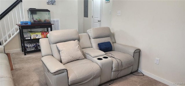 interior space with light carpet, baseboards, and visible vents