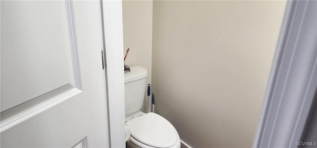 bathroom featuring toilet