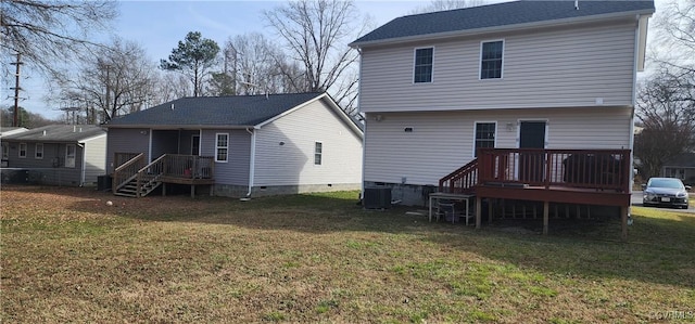 back of house featuring crawl space, central AC, a yard, and a wooden deck