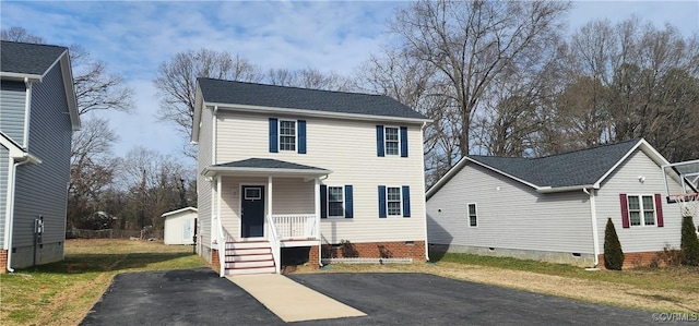 view of front of property with crawl space and a porch